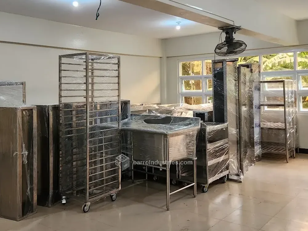 Stainless-steel tables, racks and shelving installed on a university campus