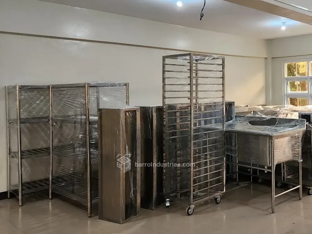 Stainless-steel tables, racks and shelving installed on a university campus